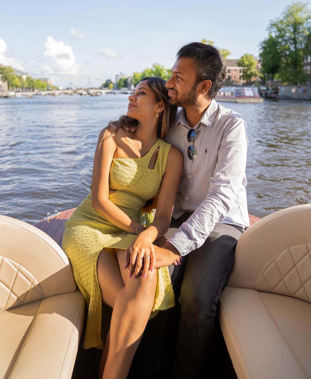 A couple enjoying a proposal shoot on a private boat in Amsterdam.